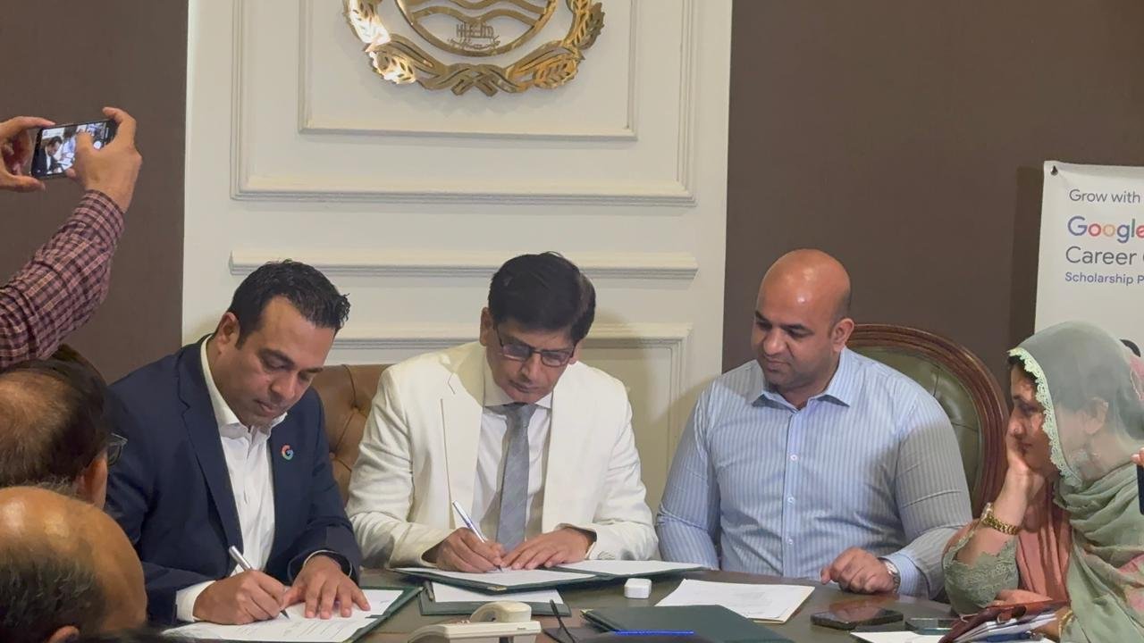 Representatives signing MoU documents at the Higher Education Department