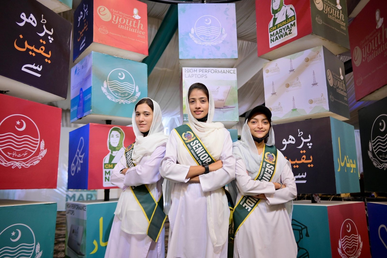 Scholarship recipients wearing sashes at a Honhaar Scholarship ceremony