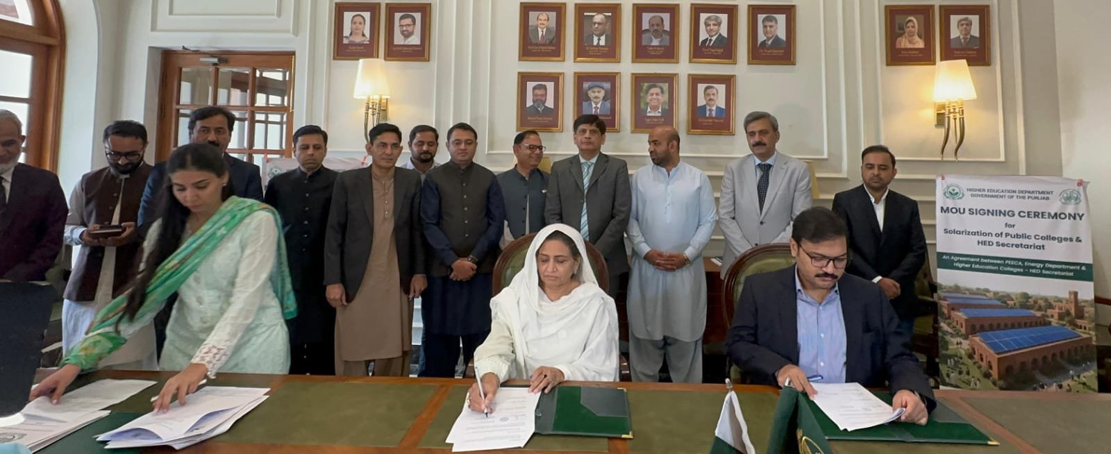 Officials signing the solarization MoU