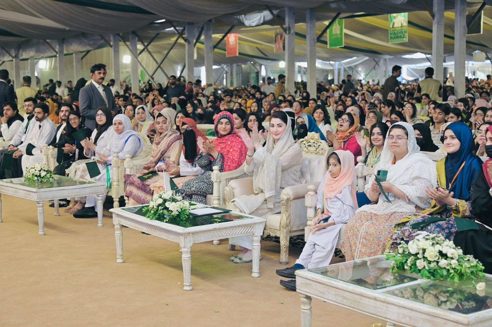Students at an earlier laptop distribution ceremony